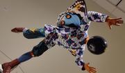 Is he going to fall, or take off? (Yinka Shonibare CBE: "Planets in My Head" exhibit. _Butterfly Kid (Boy) IV_, 2019.)